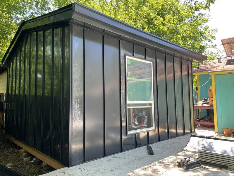 Black standing seam metal wall panels for Metal Roof Installation in Dover